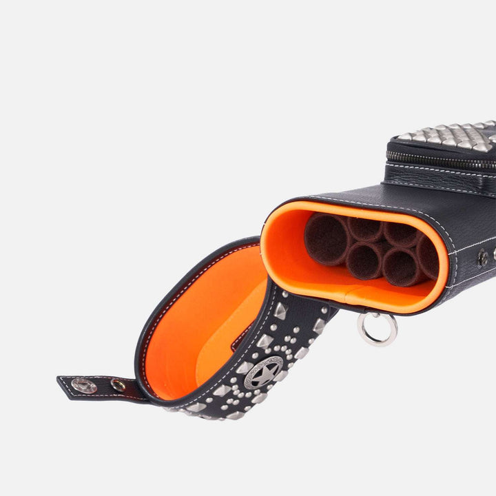 Black and orange cue case case with studded details on a white background