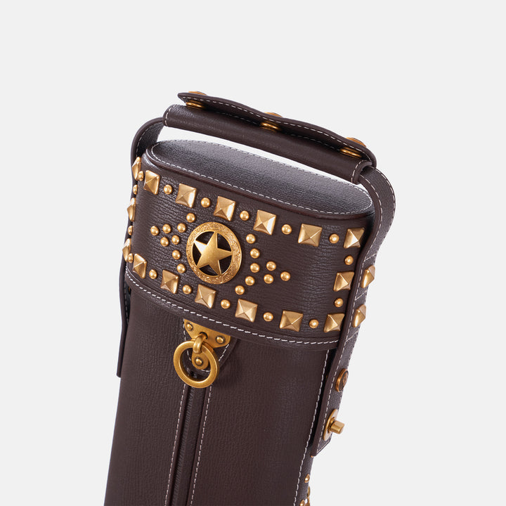 Dark brown leather cue case featuring intricate gold stud geometric patterns and a vintage design, vertical front view.