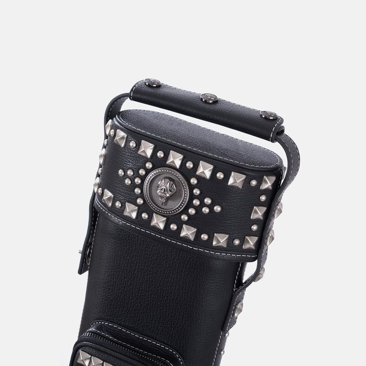 Black leather cue case featuring intricate gold stud geometric patterns and a vintage design, vertical front view.