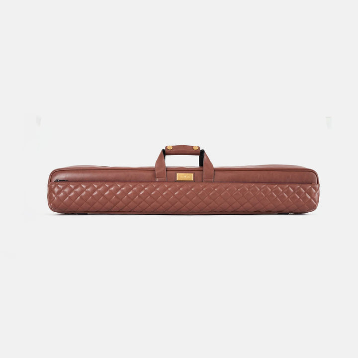 Brown quilted leather cue case on a white background