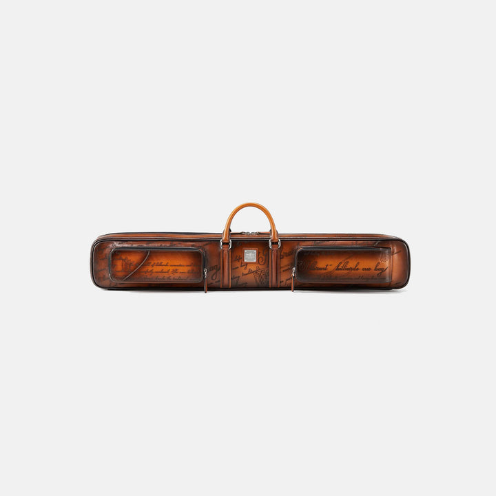 Brown leather cue case with engraved text on a white background