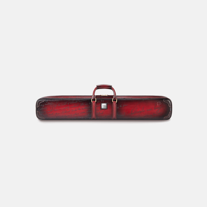 Red leather cue case with engraved text on a white background