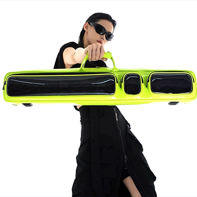Woman holds bright green Lizard cue case 