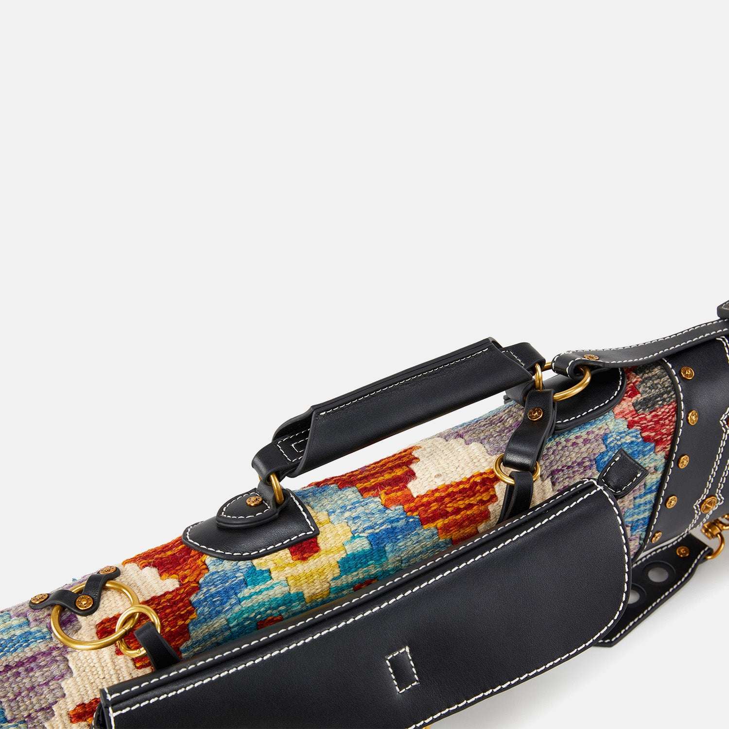 Colorful cue case with black leather straps on a white background