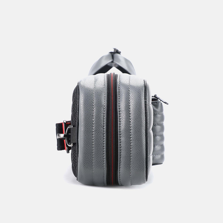 Gray leather cue case with red zipper on a light gray background